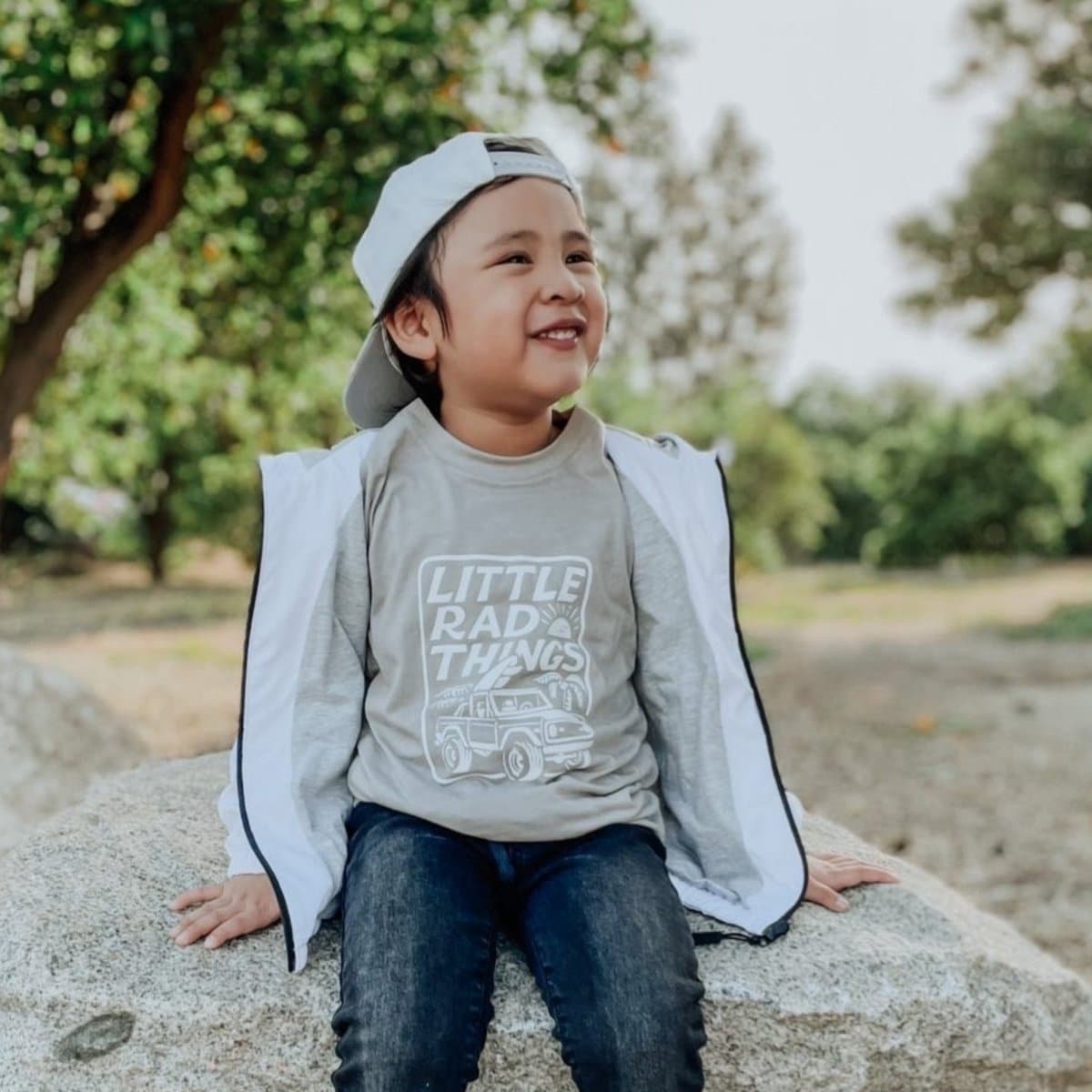 Child in THE BRONCO Ocean Cubs Wear TEE with jeans and jacket