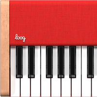 Close-up of red Loog piano, showing logo and keys.