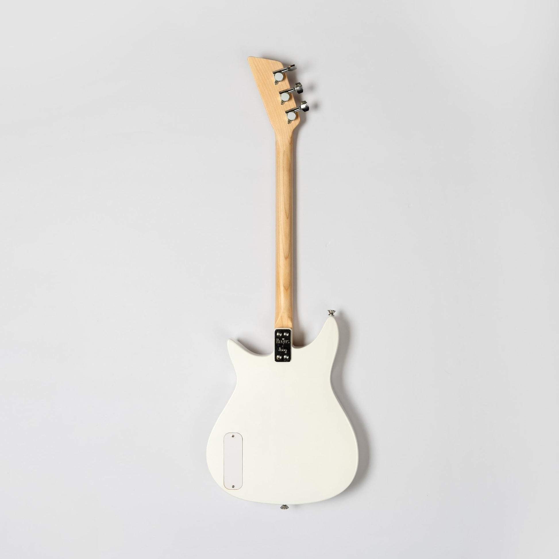 Back view of the white Beatles Loog short-scale electric guitar.